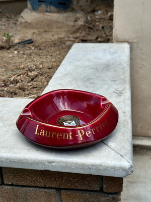 Laurent-Perrier ashtray used, red porcelain with gold details