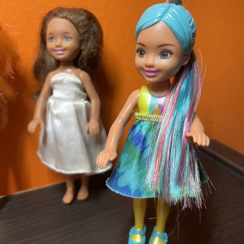 Barbie Chelsea doll set with 4 dolls and 1 mermaid, like new
