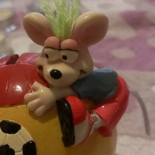 Ceramic piggy bank used with bottom opening