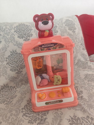 Claw Machine interactive toy used, collects dolls