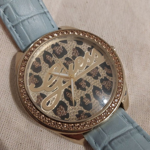 Guess 25th Anniversary Watch with Turquoise and Gold Colors