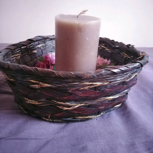 Decorative basket used with candle and floral wreath