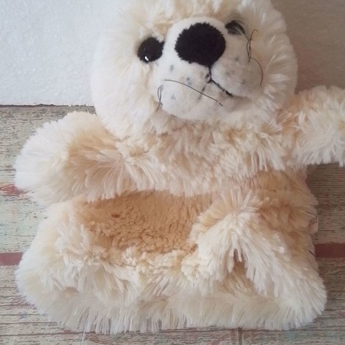 Plush glove puppet seal used, for puppet theater