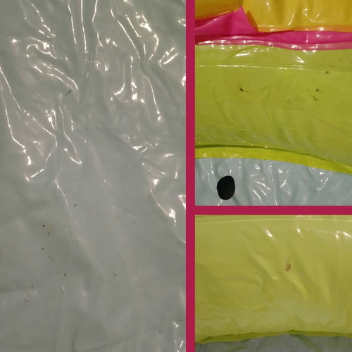 Inflatable colorful playpen used with balls and slides
