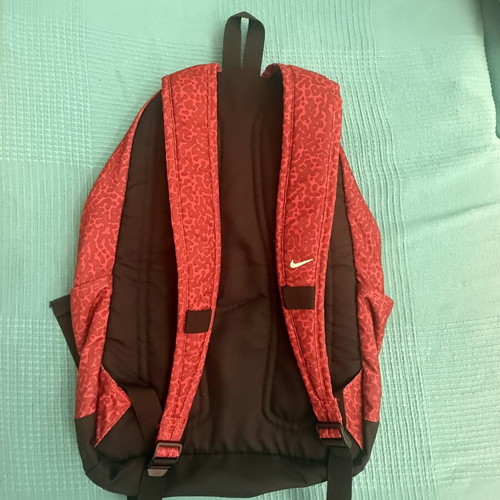 Nike backpack with one broken zipper, like new, black and red