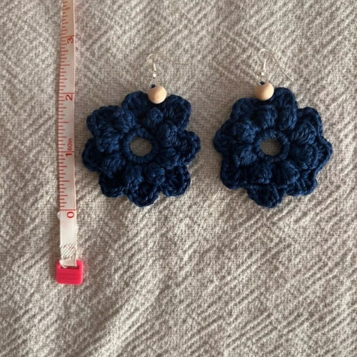 Handmade crochet flower-shaped earrings in navy blue