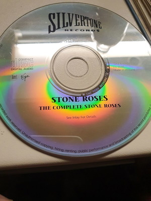 Stone Roses CD used, no cover, plays normally