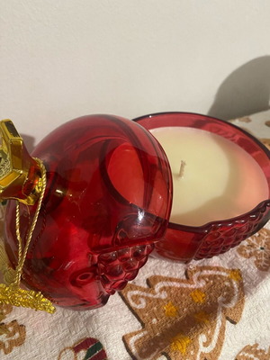 Soy candle new with melomakarono scent in glass pomegranate container