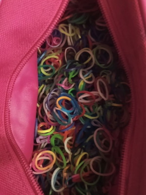 Small rubber bands used with Lancome pouch