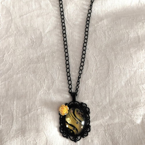 Vintage style pendant necklace with rose and butterfly details, like new