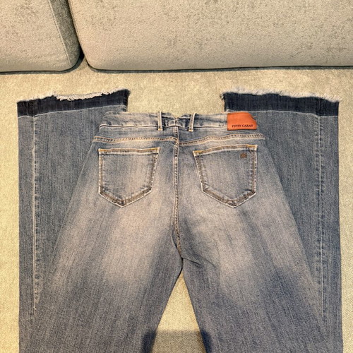 Fifty Carat jeans like new with knee rips size 28