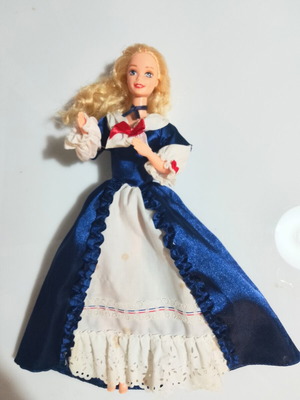 Barbie collector doll with blue dress, missing hat and shoes