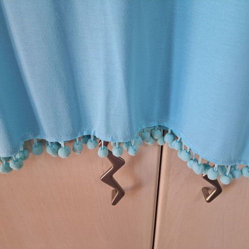 Sleeveless top new turquoise with pon pon