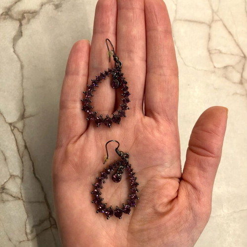 Dangling earrings with purple stones like new
