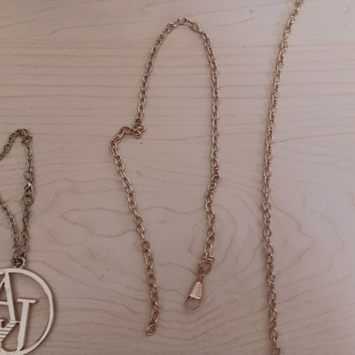 Bag decorations like new, gold color
