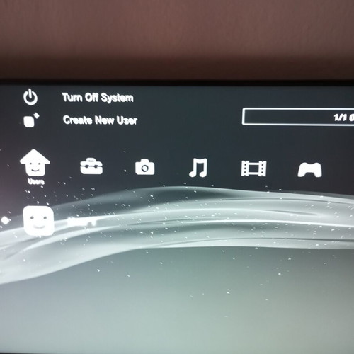 PlayStation 3 Slim console with 2 OEM controllers