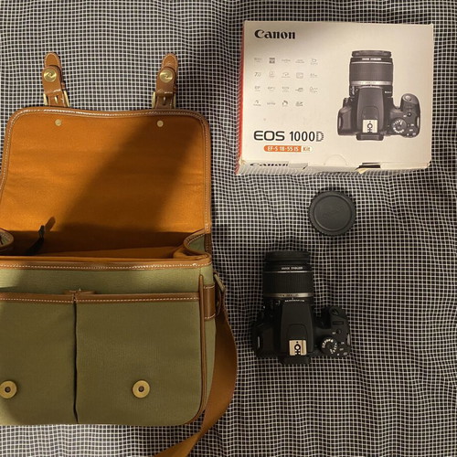 Canon EOS 1000D DSLR with EF-S 18-55mm IS lens, used