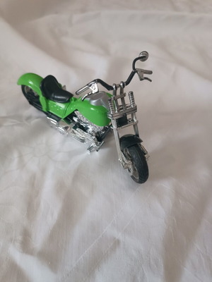 Green plastic toy motorcycle like new