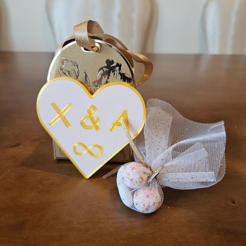 Heart-shaped bomboniera-soupla custom made with gold trim
