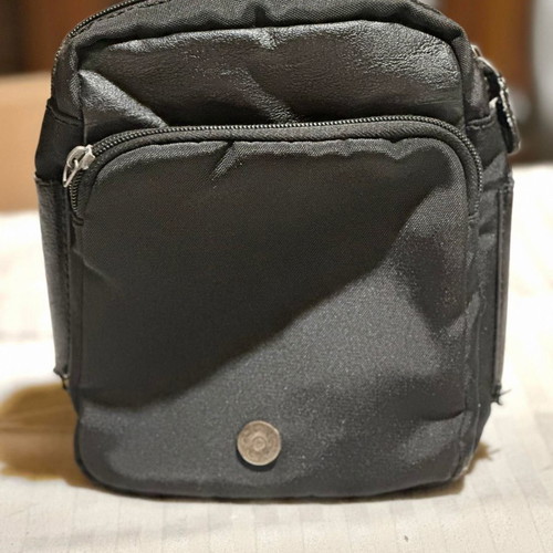 Bartuggi men's wrist bag like new, black