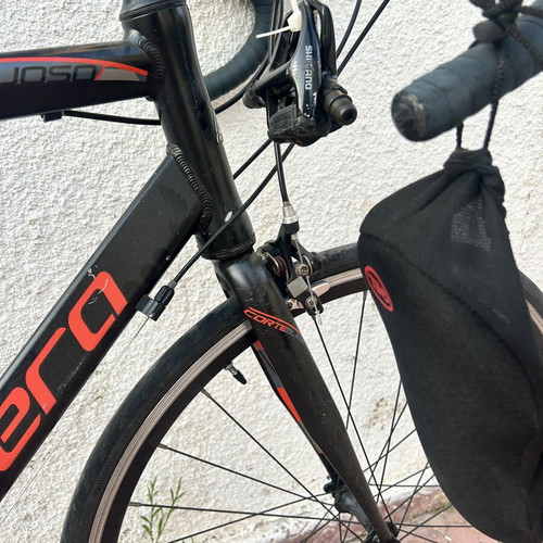 Road bike Carrera Vituoso 26 inch wheel size like new with extra cleats and gel cover