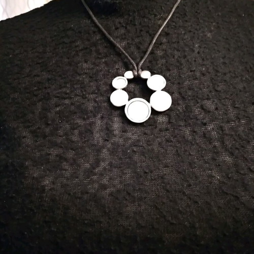 Necklace used, short metal with three mirrors and black cord