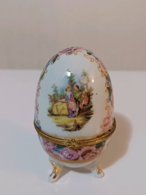 Porcelain decorative egg like new