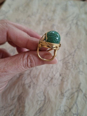 Ring with green malachite stone, like new, adjustable