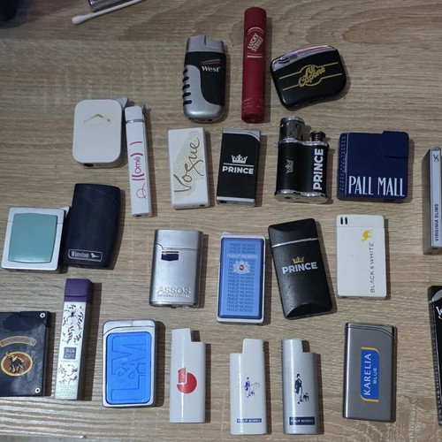 Collection of 45 advertising lighters with cigarette company logos