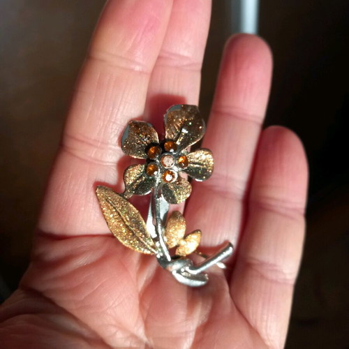 Flower pin used, orange and gold colors