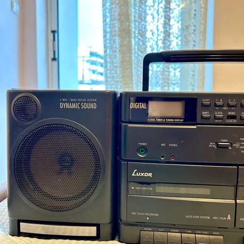 Double cassette player with detachable speakers used