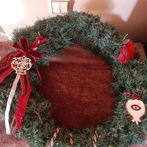 Handmade Christmas wreath with charms and battery lights