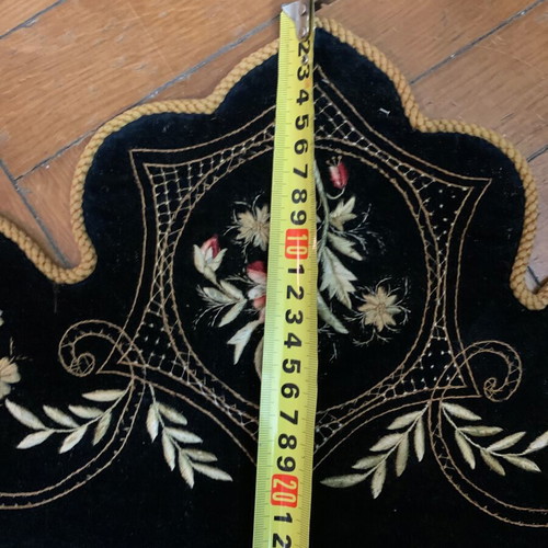 Traditional embroidery used, dark velvet