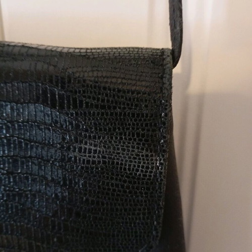 Black shoulder bag used with minor wear