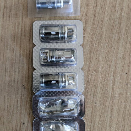 Vape device with Melo 4 head, four Eleaf atomizers and two flavor bottles like new