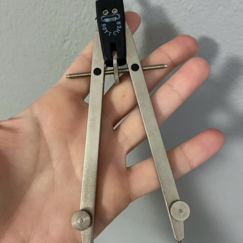 Compass used with box, sharpener, and replacement tips