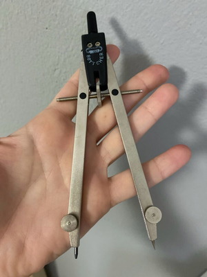 Compass used with box, sharpener, and replacement tips