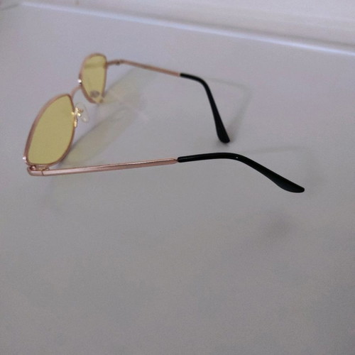 Sunglasses used with yellow lens and lightweight frame
