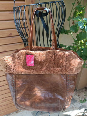 Shoulder bag brown new with fur lining and studs