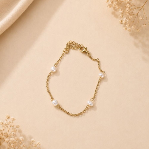 Pearl bracelet new, gold tone with white pearls, stainless steel