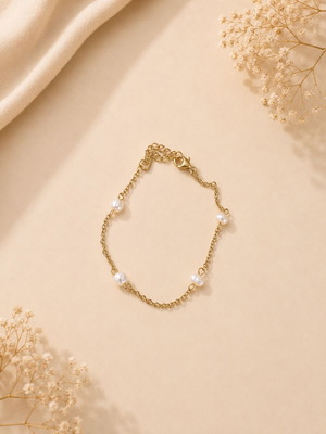 Pearl bracelet new, gold tone with white pearls, stainless steel