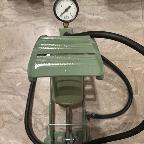 Soviet foot-operated air pump model НВН-100Б used, with manometer and hose