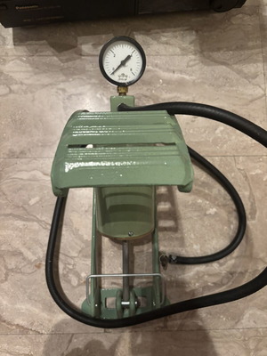 Soviet foot-operated air pump model НВН-100Б used, with manometer and hose