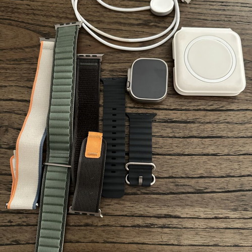 Apple Watch Ultra 1 with 4 original bands and chargers
