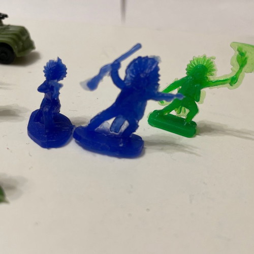 Small toy soldiers used, 26 soldiers, 3 Indians, 4 vehicles