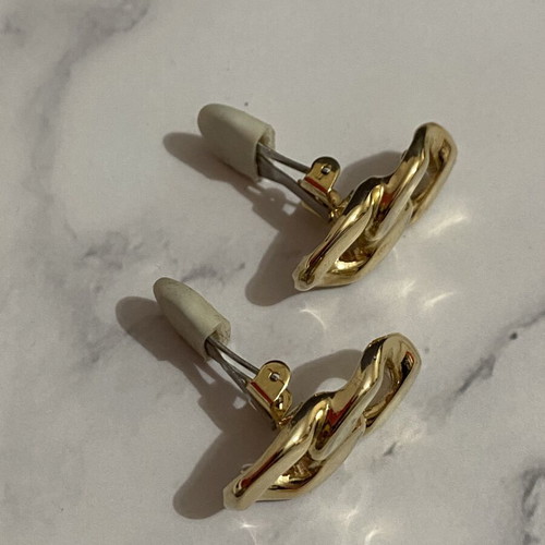 Clip earrings with chain design like new, gold color