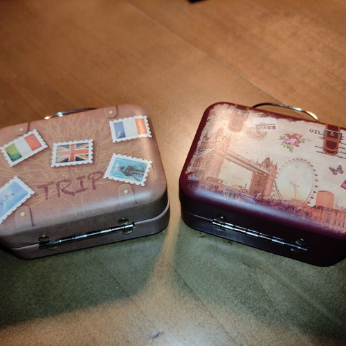 Decorative storage suitcases like new, set of 2