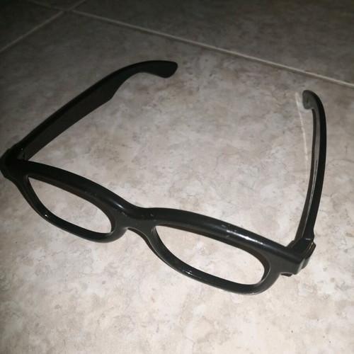 Plastic 3D glasses frame used, black without lenses