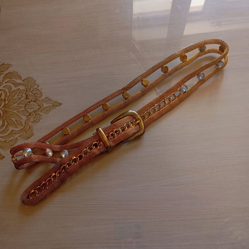 Adjustable metal belt like new with rhinestones gold color