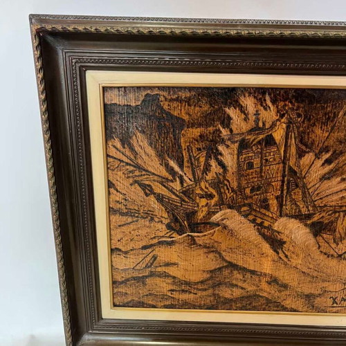Vintage pyrography wall art with shipwreck scene and artist signature, 49x58